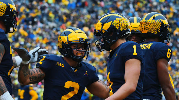 Blake Corum, Roman Wilson